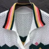 USA Men Femmes Hollow Out Jacquard Wool Button Cardigan Prillets à manches courtes Hiver Automne Elemy Tricoted Woolen Tops Gest 24SS 0411
