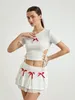 Werkjurken FUFUCAILLM Dames 2-delige outfits Leuke Bow Bandage Cutout T-shirt en elastische mini-rok ingesteld voor streetwear esthetische kleding