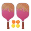 Imposta paddle in fibra di vetro e palline impostate per la competizione di giochi all'aperto