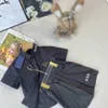 Classics Kids Designer Vêtements Summer Children's Set Baby Tracksuits Taille 100-160 cm Col à collier noir pur et shorts 24April