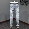 Jeans masculin High Street Fashion Men Retro Retro Blue Stretch Skinny Fit Skinny Ripped Leather Patted Designer Hip Hop Brand Pantal