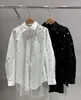 Blouses de femmes Européen Luxe Luxury French Blouse Simple Loue à revers à revers à manches longues Coton