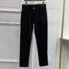 Printemps / été élégant élégant marque de mode haut de gamme lourde artisanat lavé les produits européens lavés élastiques slim small small jambe jeans