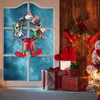 装飾的な花の年の壁の窓/正面玄関の装飾漫画のピエロの縞模様のエルフの脚クリエイティブ光沢のある丸いクリスマスの花輪