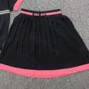 Eenvoudige gebreide shirt rok dames mode -borduurbrief geplooide rok slanke bemanning nek dunne breierwear