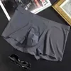 Underpants L-XXXL senza saldatura da maschere di seta di seta ghiacciata da uomo a colori solidi Ultra-sottili biancheria intima sexy estate cool bagagli pantaloncini c240411