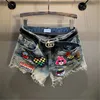 Летние джинсовые шорты женщин вышивая мода вымытая рваная джинсы женская уличная одежда с высокой талией шириной 240411