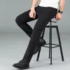 Jeans maschile puro versione coreana nera pantaloni dritti alla moda comodi ed elastici affari classici