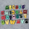 Broches 5 stcs/lot 26 Engelse letters druppellegering broche fashion alles kleding hoed tas accessoires