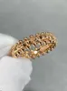 Designer charm Xia Xiaojings rivet ring diamond grid rotating bullet head rose gold couple personalized design