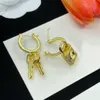 قفل مفتاح فاخر هوب مصمم سحر Dangler Dangler Diamond Buds 18k الذهب الفضة مطلي بالفولاذ المقاوم للصدأ