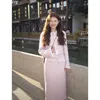Arbetsklänningar koreanska söta rutiga rosa jacka kjol tvådelar set kvinnor mode flounc splice temperament kändis smal vår chic lady kostym