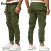 Męskie spodnie modne Flape Streetwear Pockets swobodne 2024 Ładunki mężczyźni chude dżinsy spodnie sprężyste talia sznurka szarość