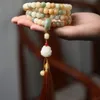 Bodhi Raiz Bodhi Bodhi Bodhi Rosário gradiente de frango Amarelo amarelo Mão de mão Tassel Bodhi Buddha Bead