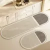 Tapis 60 cm super absorbant tapis de cuisine non glipage tapis diatomite elliptique de tapis long galets simples de salle de bain