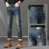 Designer de jeans masculin automne et hiver nouveau jean pour les produits européens de qualité masculine slim fit small pieds pieds à la mode.