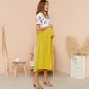 Patpat Nieuwe aankomst Zwangerschapsronde Ronde kleurblok kleurblok gele midi h korte mouw verpleegkundige jurk