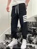 سروال رجال هوديي suprenne mans sweatpants البضائع العرق هارون قابلة للطي رمادي سراويل السوائل السود