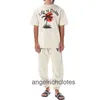 Vêtements de créateurs haut de gamme pour PA Angels Red Sun Coconut Tree Skeleton Imprimer à manches courtes Tshirt pour hommes et femmes High Street Malf manche avec étiquette de marque Original 1: 1