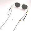 Brillenkettenbrillen Kette Schwarzes Blattbrillen stehen mit Sonnenbrille Ständer Frauenhals Maske Schlinge C240411