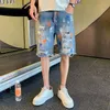 Shorts maschile graffiti uomini strade denim versione coreana Trend pantaloni a cinque punti dritti a cinque punti strappati jeans sciolti maschio