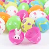 Parti dekorasyonu 12/24pcs Doldurabilen Paskalya Yumurtaları Yumurta Avı Sürpriz Dekorasyonları İçin Renkli Basılı Plastik Çocuk Hediyeleri