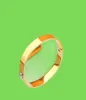 Stile moda in acciaio in acciaio in acciaio uomo bracciale anelli da donna anelli incisi Iniziali a fiore singolo rivet nanogramma braccialetti 4105199