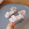 Sandaler 2023 Girls Summer New Water Diamond Little Girl Princess Shoes Korean Butterfly Knot Open Toe Beach H240411