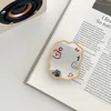 Migne Love Heart Make Up Mirror Bracket Phone Grip Tok Tok Korea Honder Ring pour iPhone Samsung Accessoires Seckder Phone Stand