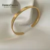 Pulseira europeia e americana simples cor de ouro liso de ouro aço inoxidável Bracelets de manguito para homens e mulheres Jóias de joalheria Bracelets 240411