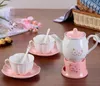 찻 주식 세트 꽃 모양의 구호 세라믹 커피 컵과 난방베이스 티와 냄비 세트