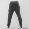 Calça masculina coloração sólida cordas de cordão macio calça de moletom com cintura elástica bolsos respiráveis soltos para conforto