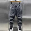 Jeans maschile primavera autunno 2024 in denim elastico studenti sciolti adolescenti cowboy gamba harem gamba lunghe pantaloni