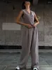 Pantalon à deux pièces pour femmes Définit le bouton des femmes sans manches à manches O-cou court et pantalon haute taille 2 pièces conviennent à la casua féminine