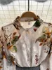 Chemises de chemisiers pour femmes printemps d'automne tempérament mode rétro rétro mousseline de mousseline à fleurs imprimées à manches bouffantes en vrac