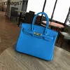 BK Designer Lederbeutel handgefertigte himmelblaue Litschee Getreide Damenbeutel hell weiche Handtasche Schulter Mitte