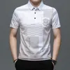 Polo Polo imprimé graphique Bouton de lettre de revers d'été t-shirts à rayures Tops hommes Vêtements à manches courtes Ropa Hombre 240411