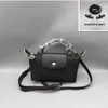 Los bolsos de la tienda están en venta de liquidación 95% de descuento en 2024 Spring Bag Street Fashion Fotografía para mujer Dumpling Pequeño Elección de hombro Bolsos pequeños