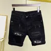 Shorts masculinos de cor sólida versátil jeans elegante com bolsos rasgados de retalhos de rua até o joelho para o verão