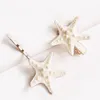 2pcs Clips de cheveux des étoiles de mer Natural Beach Sea Star Hair épingles pour les femmes et les filles Hair Hair Barrettes Accessoires de coiffure de sirène