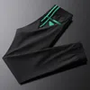 European Summer Lightweight White Sports Casual Pants Mens Ice Silk Breathable Guard Pants Mens Fashion Brand 9-point Pants 240408