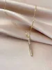Anhänger Halsketten neuer Stil Titanstahl Farbkristalle aus Shell Long Pendant Halskette Ladies Mode Luxus -Schlüsselbeutel Kette Schmuck 240410