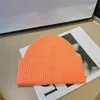 Mode beanies designer vinter bönor män kvinnor design stickade hattar fall ull cap jacquard unisex 100% kashmir brev fritidsskalle hatt utomhus