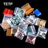 Tetp 100pcs mini sacs ziplock avec motif pour le voyage à domicile Collier de boucles d'oreille accessoires d'emballage organisateur de stockage d'emballage