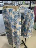 Pantalon féminin mode printemps d'été Imprimé le haut élégant et le pantalon de jambe large vêtements de bureau