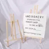 Ramar klassrum barn bordsskiva träutställning konst hantverk display stativ målning staffli hylla hållare