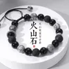 Bracelet d'obsidien pour hommes en pierre volcanique Niche Niche haut de gamme Sentiment de perles de perles exquises