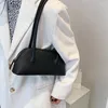 Umhängetaschen 2024 Mode Frauenmarke Handtasche und Geldbeutel Lady Reise Tasche Einfacher Stil kleiner PU -Leder -Unterarm für Frauen