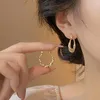 Hoop örhängen design ljus lyx unik zirkon winding 2024 mode kvinnor eleganta guldfärg metall smycken gåvor