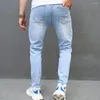 Jeans maschi maschi che allungano buchi magri pantaloni da maschio eleganti.